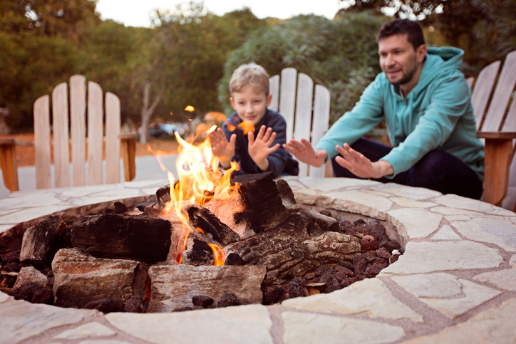 outdoor fire pit dad and son